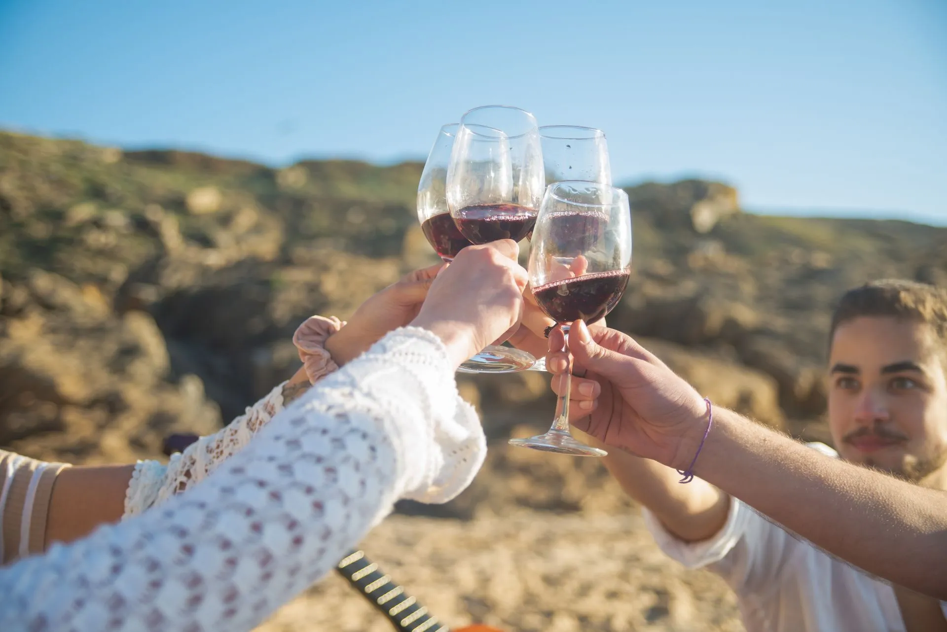 Glasses of Portuguese red wine on a barrel at a family winery in the Arrábida hills near Lisbon