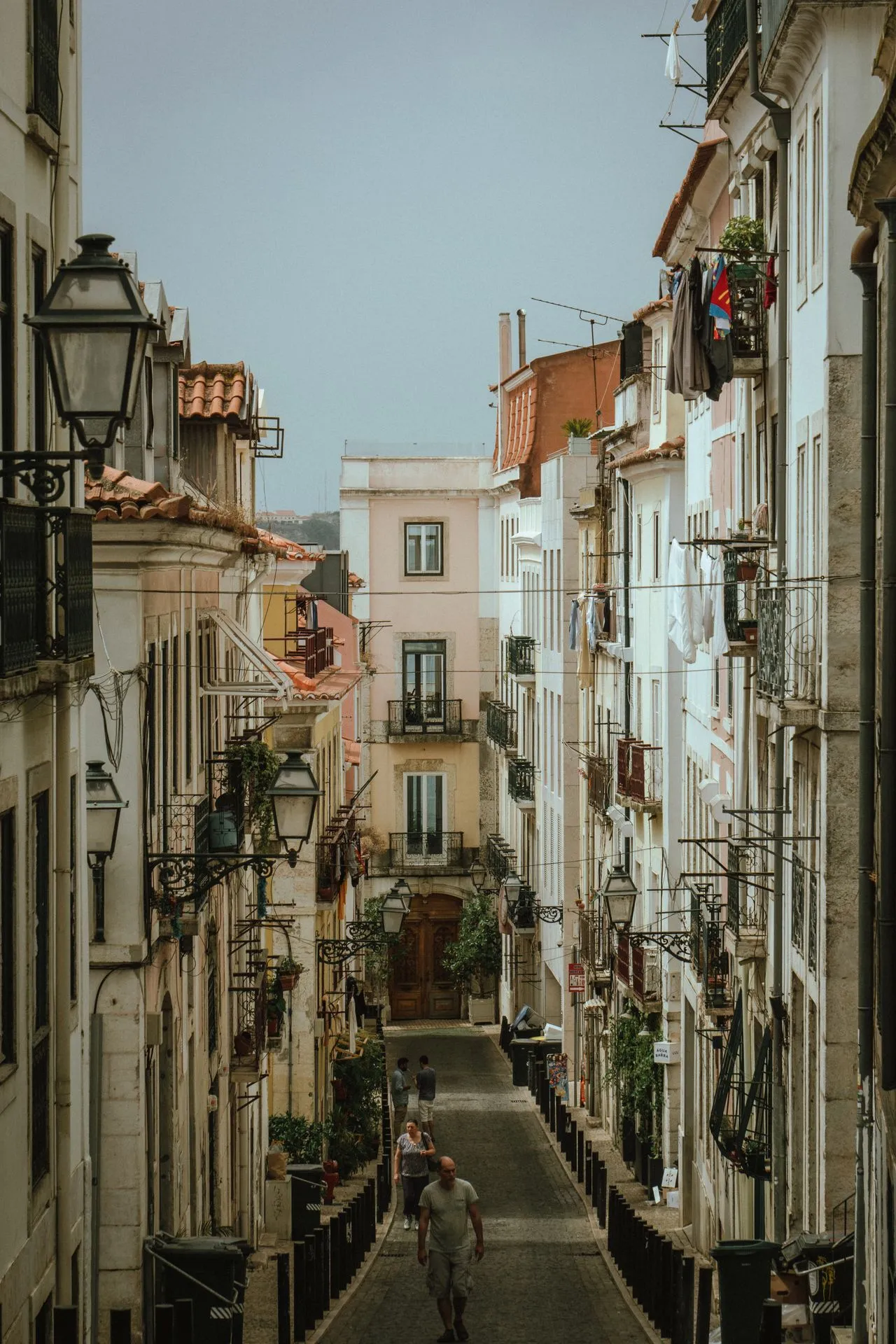 The narrow streets of Lisbon, showcasing historic buildings with typical Portuguese charm